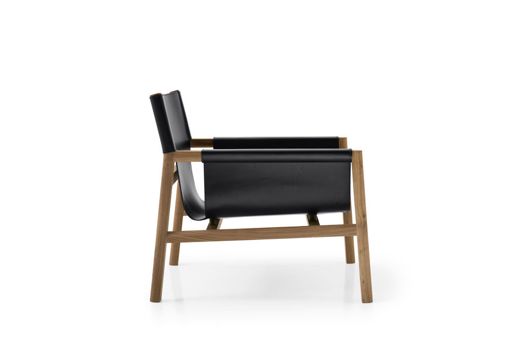 Husk armchair with welcoming backrest by B&B Italia, design by